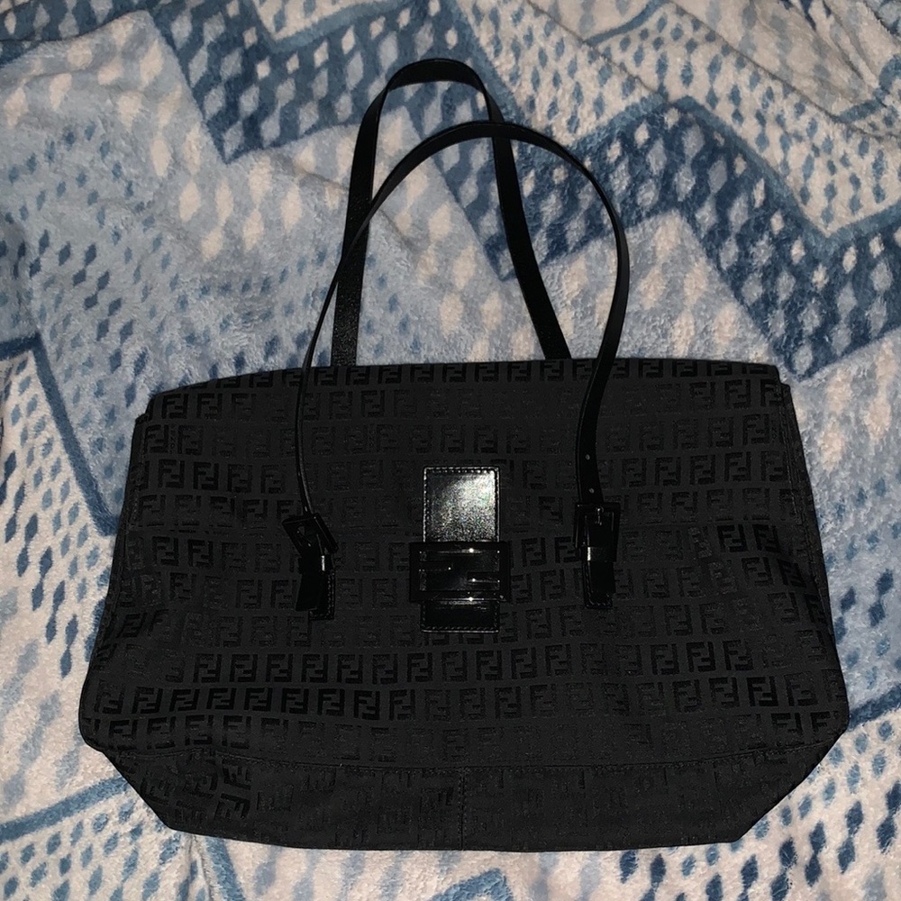 A black Fendi tote bag